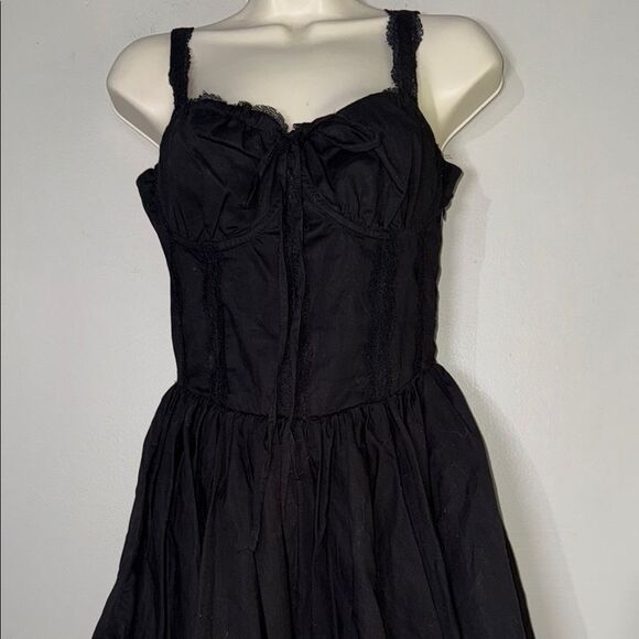 FOREVER 21
Lace-Trim Bow Bustier Mini Dress Small - Picture 7 of 13